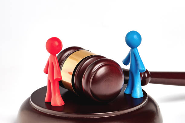 istock . Toy plastic men isolated on white background. The arbitrator examines a conflict situation between people. Court and law. Justice. Verdict. Legal support. Conflict of interest. Smoothing disputes. 1315010721