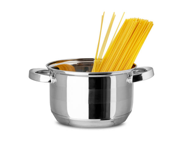 istock Italian spaghetti in stainless pot isolated on white background 1315012664