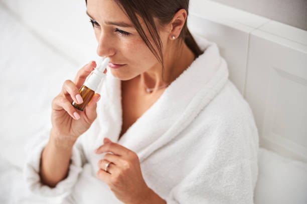 istock Charming young pretty lady spending time in home apartment while getting sick 1315013472