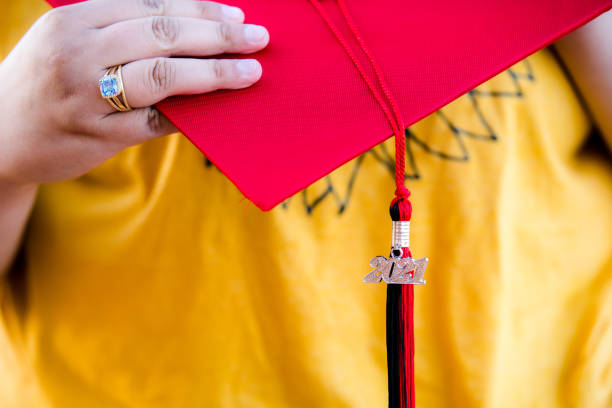 Close up of mortarboard with tassel and Class of 2021 charm.