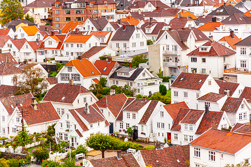 Tidy white houses, rainy day Stavanger, Norway, aerial view.