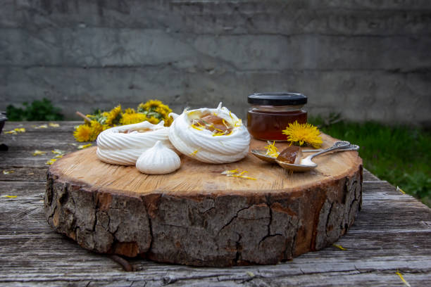 istock Anna Pavlova cake with lemon curd and dandelion syrup 1315023703