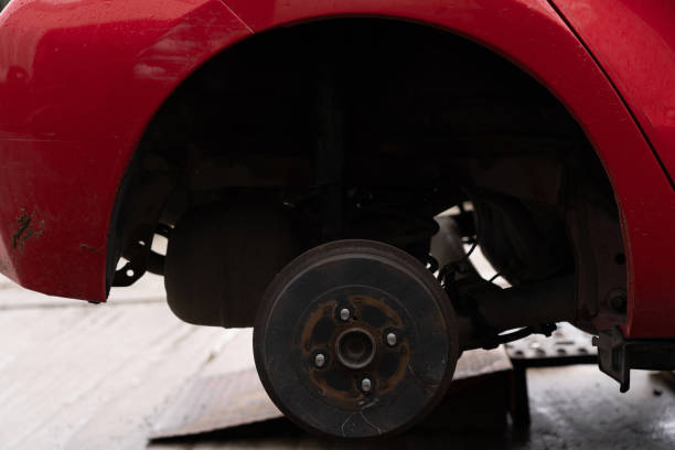 istock red car being repaired dismantled wheel 1315024252