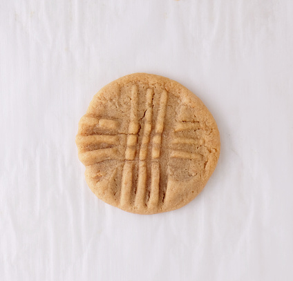 Old fashioned peanut butter cookie on white background from top view for baking dessert food concept.
