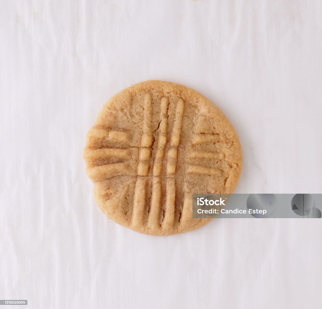 round peanut butter cookie on white background Old fashioned peanut butter cookie on white background from top view for baking dessert food concept. Peanut Butter Cookie Stock Photo