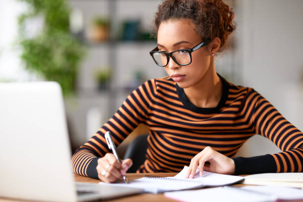 istock Young afro american woman working remotely or studying online at 1315026441