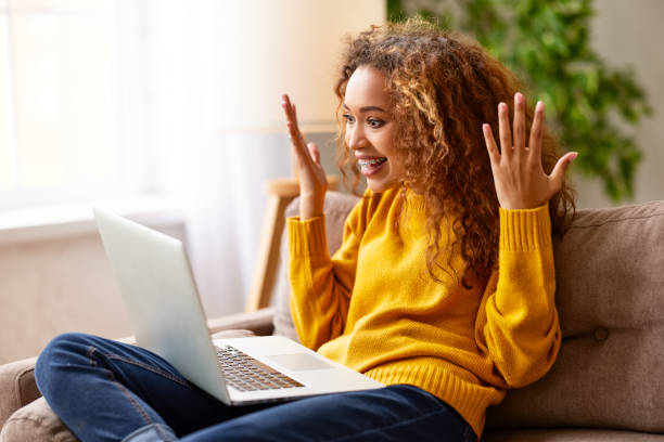 istock Surprised afro american woman having video call while working or 1315026487