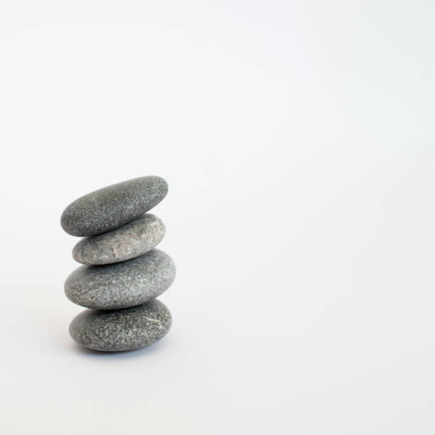 istock Pile of four stones with white background 1315026858