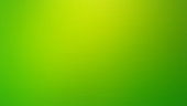 Yellow and Green Defocused Blurred Motion Bright Abstract Background