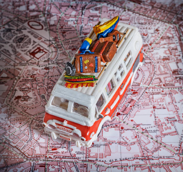 istock Motor home camper driving on map of Milan 1315028971