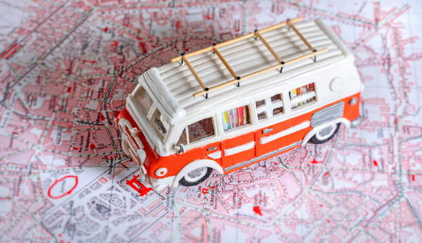 Motor home camper driving on map of Milan