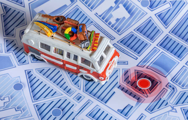 istock Motor home camper driving on blue city map 1315030341