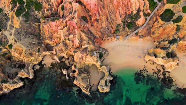 Drone shot of rocky cliff and sea, Lagos, Algarve, Portugal