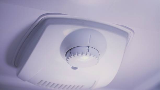 istock Adjusting Fridge Thermostat using a Selector Knob Inside of the Cooling Chamber 1315032730