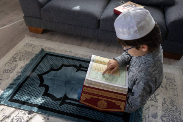 istock A Muslim Turkish Boy Reading the Quran 1315037998