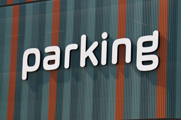istock Parking text inscription on a colored building facade in Cham, Switzerland 1315038451