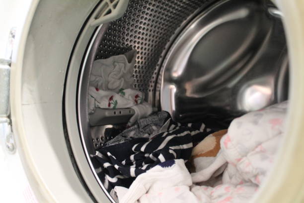 istock Inside the drum of the washing machine with laundry 1315038535