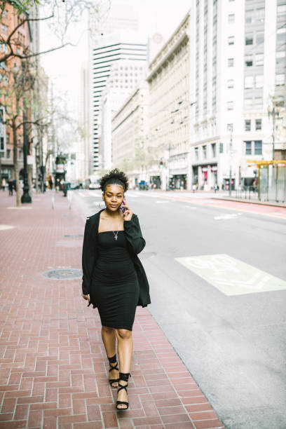 istock Confident woman walking down the street 1315040218