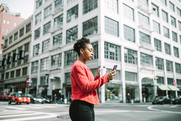 Woman using smartphone in the city