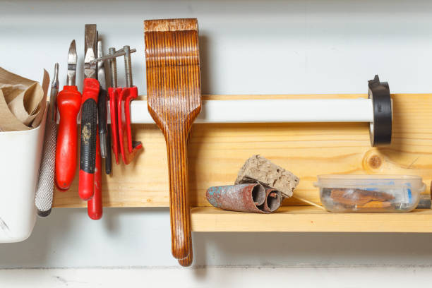 Tools in the workshop. Pliers, pliers, clamps, sandpaper. Concept of manual labor, home workshop stock photo