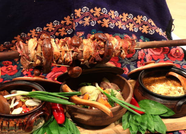 istock Serbian cuisine,barbecue on a stick and traditional dishes under it 1315050882