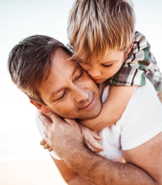 istock happy father embracing the son 1315060948
