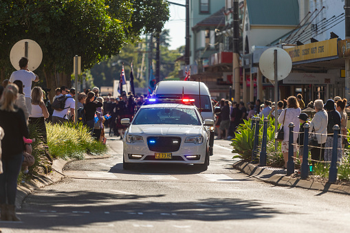 Lismore, Australia - April 25, 2021: Police car leading the ANZAC Day parade in Lismore