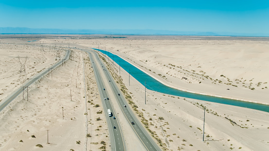 Interstate 8 running through the desert and along the All-American Canal in Imperial County, California.