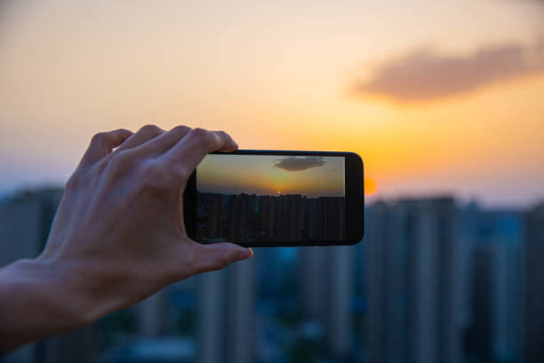 istock Photographing city sunset 1315102032