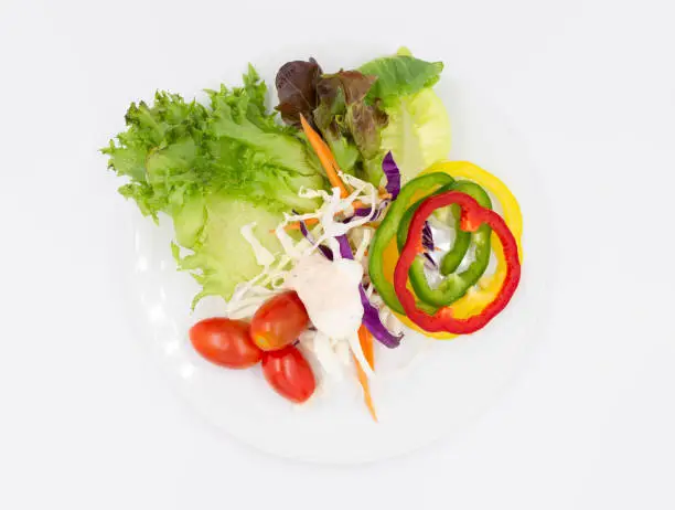 fresh vegetable salad on white background