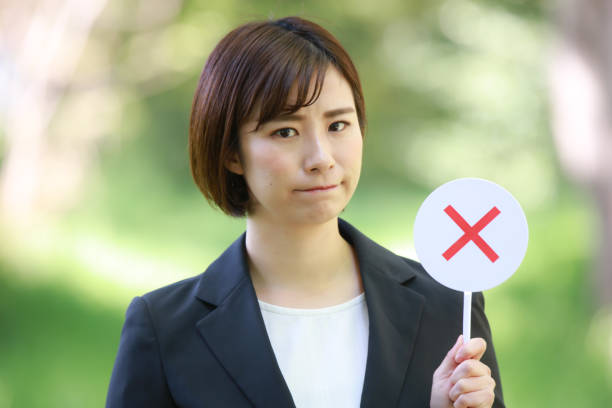 istock × Female employee with a tag 1315105842