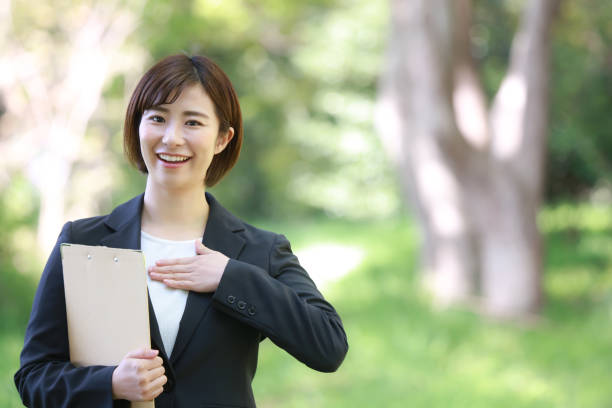 istock Female employee with binder 1315105880