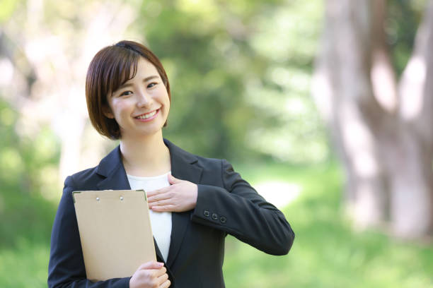 istock Female employee with binder 1315106128