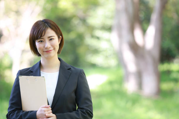 Female employee with binder