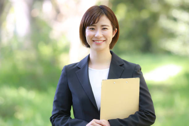 istock Female employee with binder 1315106699