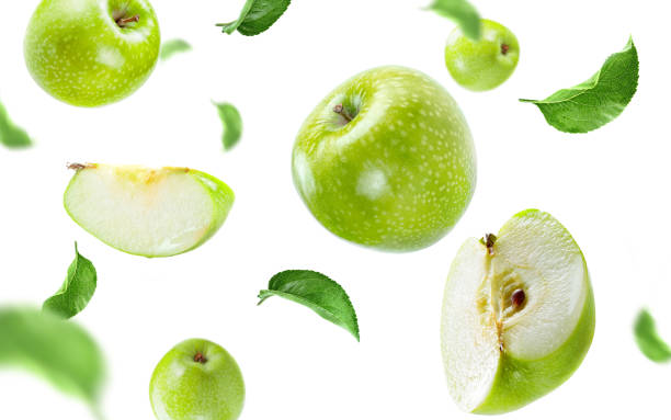 istock ripe apples group, slices and leaves surfing on air 1315106817