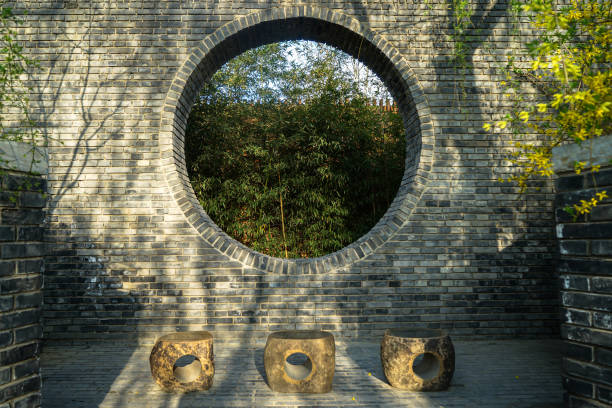 istock Garden wall stone chair background 1315108112