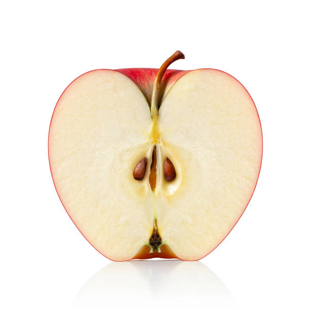 apple se reduce por la mitad - isolated apple slices fotografías e imágenes de stock