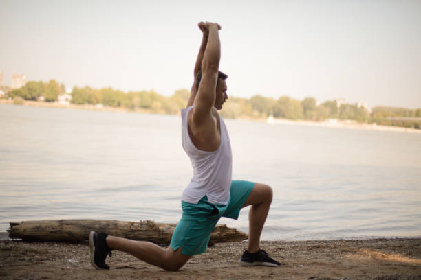 istock Young sports man working exercise on the beach. 1315112360