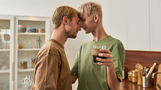 istock Smiling young caucasian gay pair tenderly hugging 1315114930