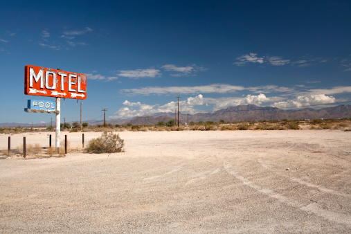 Old long forgotton motel sign along Route 66 in Arizona