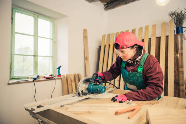 istock female carpenter work in a woodshop 1315117593