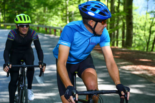 istock Male friends cycling 1315118601