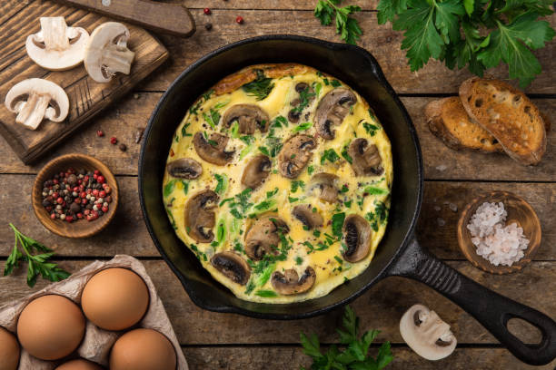 istock omelette with mushrooms on cast iron pan 1315120777