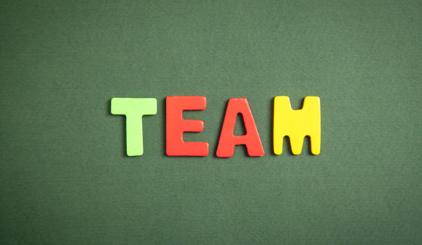 istock Colorful word Team on green background. 1315121867