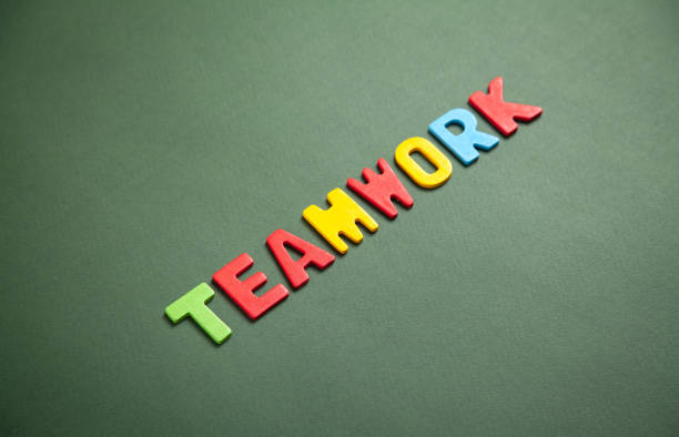 istock Colorful word Teamwork on green background. 1315121871