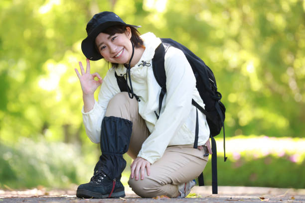 istock A woman who wears a gaiter and makes a circle by hand 1315122941