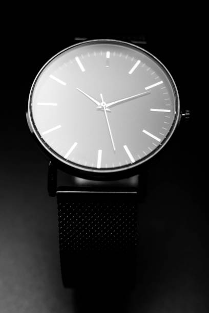 istock unbranded black analog wristwatch with silver hands 1315125619