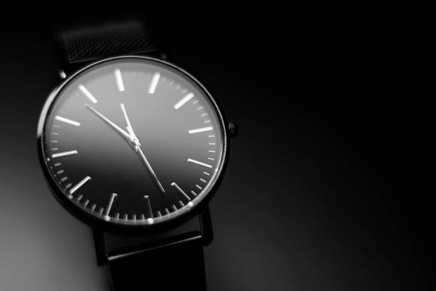 istock unbranded black analog wristwatch with silver hands 1315125628