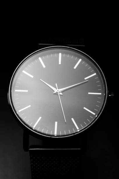 istock unbranded black analog wristwatch with silver hands 1315125629